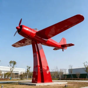 Large Red Metal Fighter Jet Airplane Sculpture