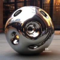 Abstract Metal Sphere Sculpture With Large Holes