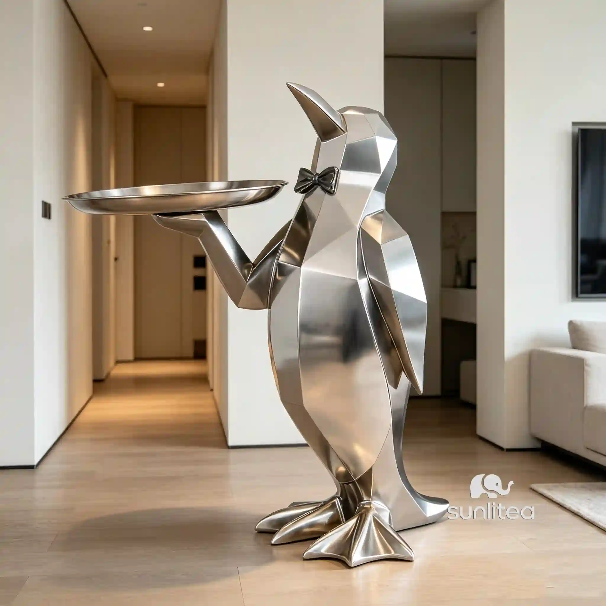 Penguin Butler Statue